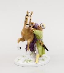 Скульптура «Мужчина, взнуздывающий лошадь»