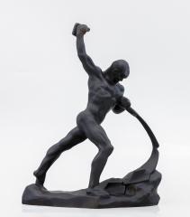 Скульптура "Перекуём мечи на орала"